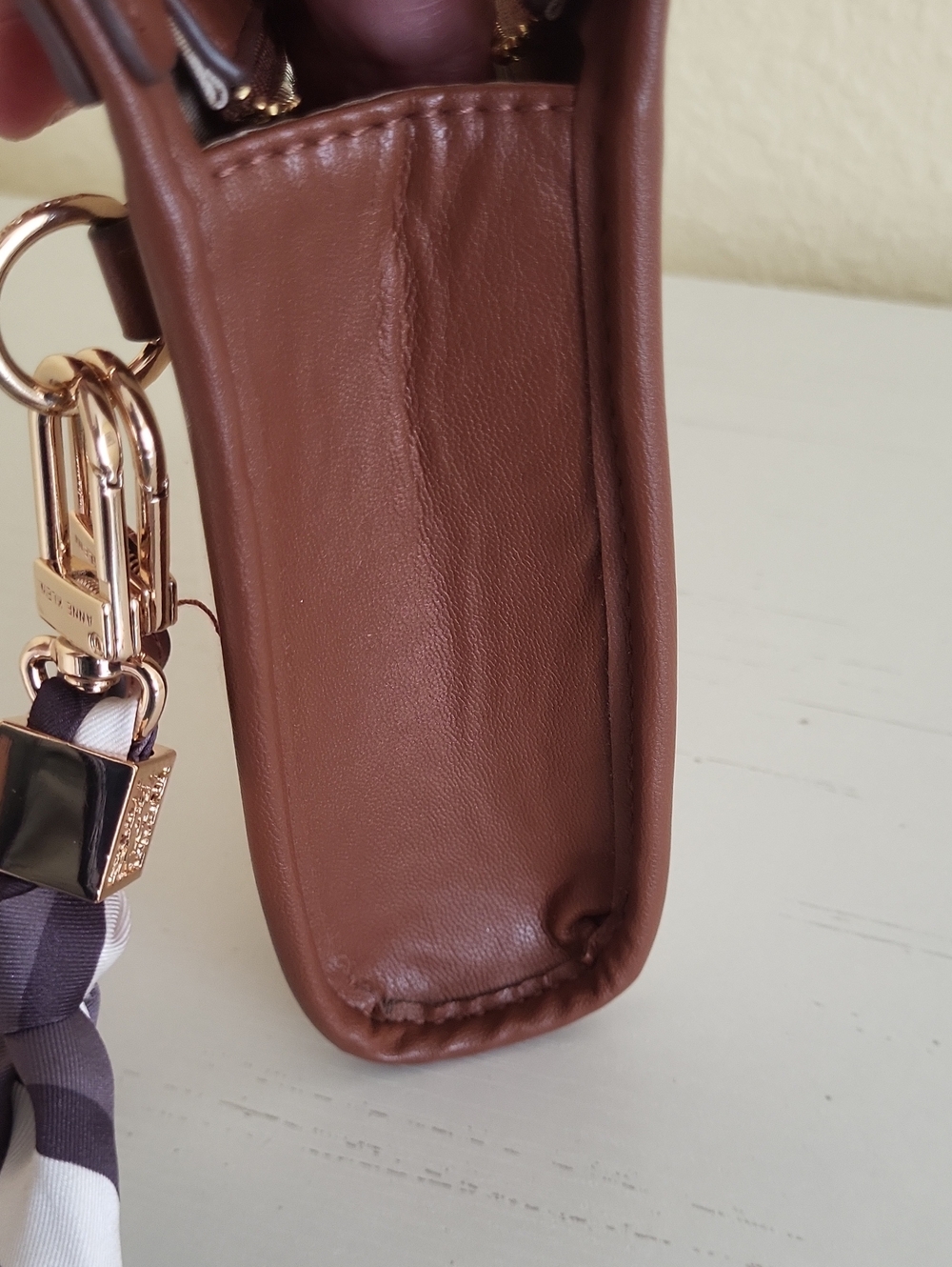 Anne Klein Canvas and Brown Faux Leather Wristlet - Picture 6 of 8